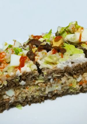 Una foto de Pastel vegetal con pan de centeno