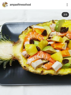 Una foto de Piña rellena de marisco