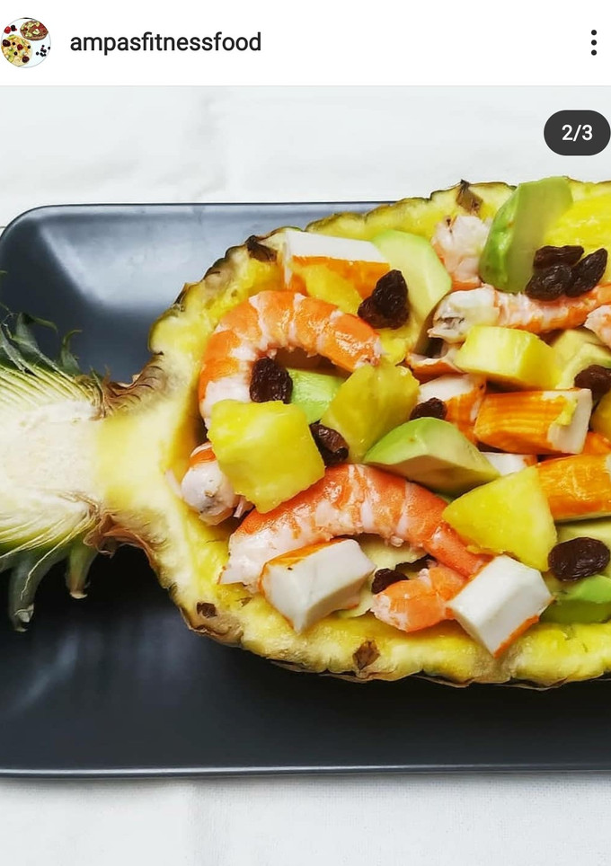 Una foto de Piña rellena de marisco