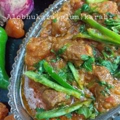 A picture of Aloo bhukara(plum) mutton boneless karahi.