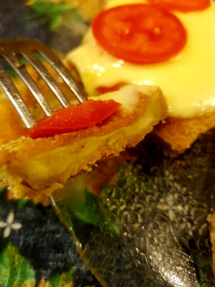 Una foto de Milanesas de berenjena a la napolitana
