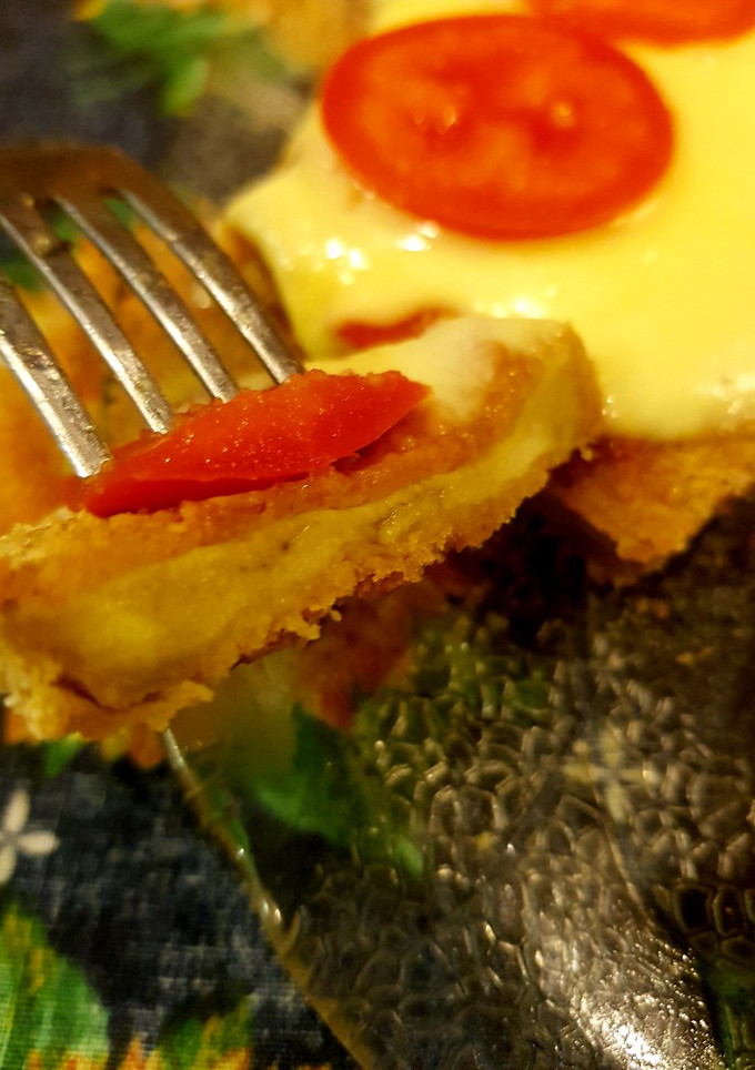 Una foto de Milanesas de berenjena a la napolitana