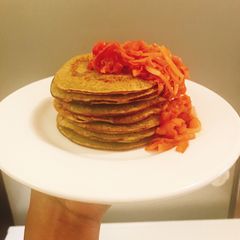 Over ripe plantain pancake with pepper/tomatoes sauce A picture of Over ripe plantain pancake with pepper/tomatoes sauce.