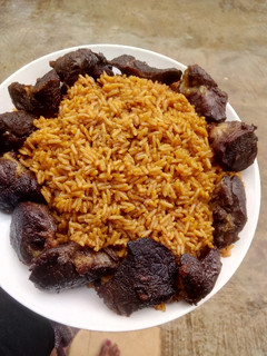 A picture of Jollof Rice with cloves spice.