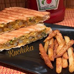 Scrambled eggs and masala fries sandwich A picture of Scrambled eggs and masala fries sandwich.