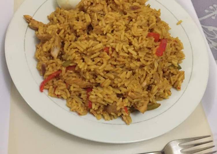 Jollof rice with shredded chicken