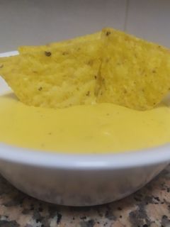 Una foto de Salsa de queso para nachos en Mambo
