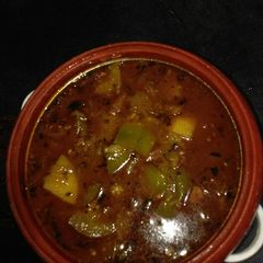 A picture of Aloo Baingan curry.