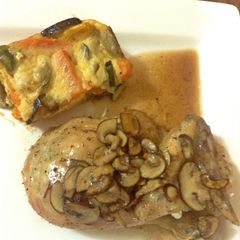 A picture of Roast Chicken with Wild Mushroom and Madeira Roasting Juice.