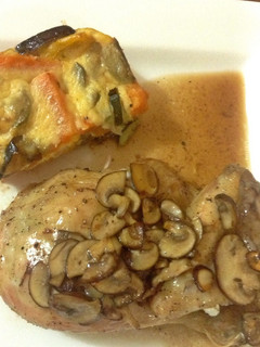 A picture of Roast Chicken with Wild Mushroom and Madeira Roasting Juice.