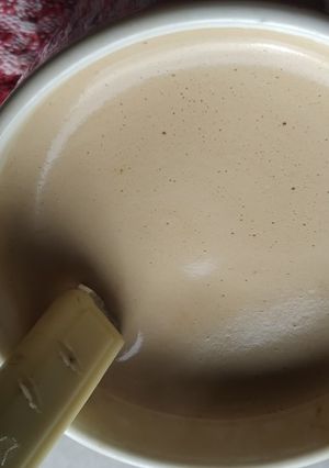 Una foto de Café negro bien espumoso
