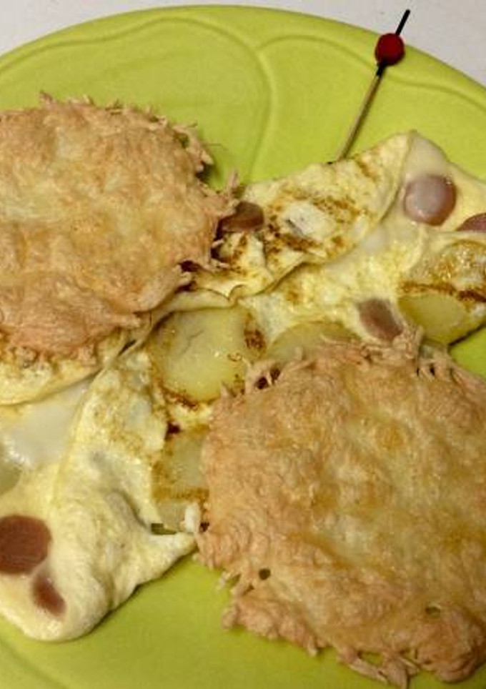 Una foto de Piruletas de queso con tortilla fina 🍭🧀