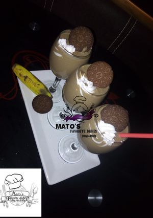 A picture of Oreos and banana smoothie.