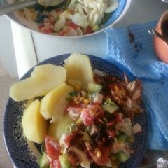 A picture of Boiled Irish Potato with Salad.