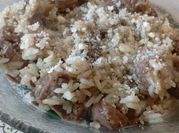 Una foto de mollejas con arroz