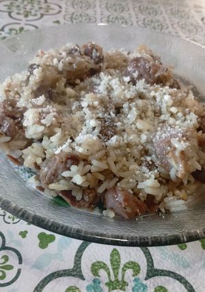 Una foto de Mollejitas de pollo con arroz y champiñones