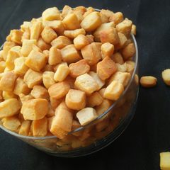 A picture of Crispy pomegranate seed shape snack.