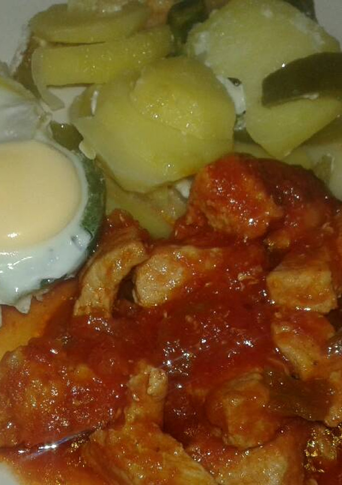 Una foto de Carne con tomate