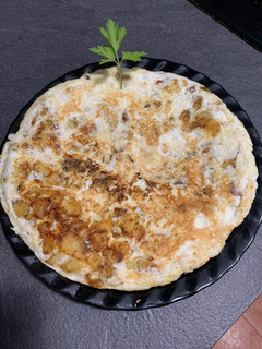 Una foto de Tortilla de patatas crujientes y claras