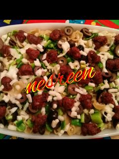 صورة لوصفة 🍕 بيتزا المكرونه بالسجق