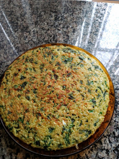 Una foto de Tortilla de arroz con espinacas y verdeo
