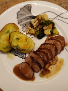 A picture of Tenderloin Steak with grape sauce.