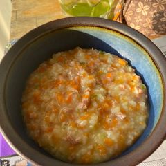 A picture of Congee with Carrot and Sausage.