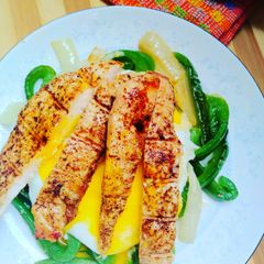 A picture of Grilled chicken breast with egg.