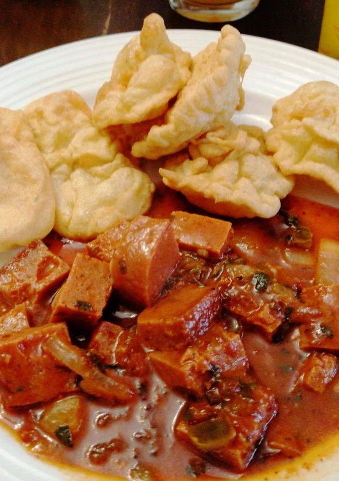 Una foto de Jamonilla en Salsa de Tomate & Torrejas de Harina
