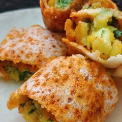A picture of Schezwan masala dosa rolls.