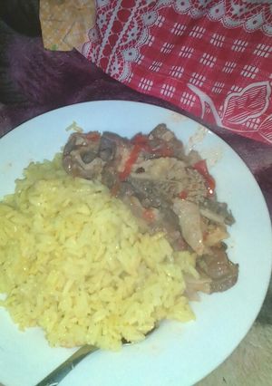 A picture of Tumiric rice and tripes.