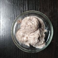 A picture of Banana and shredded coconut icecream.