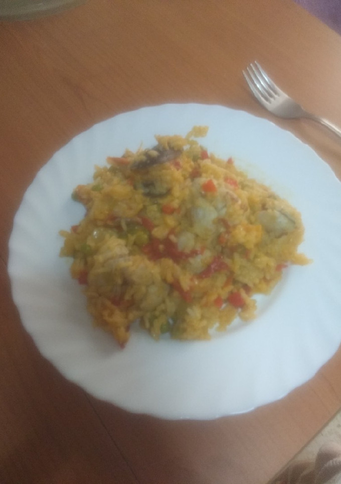 Una foto de Arroz con marisco a mi manera