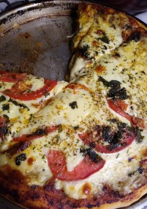 Una foto de Pizza al molde "Mita y Mita"