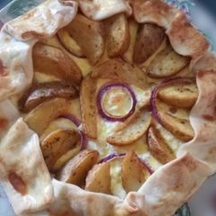 A picture of Potato wedges and feta pie.
