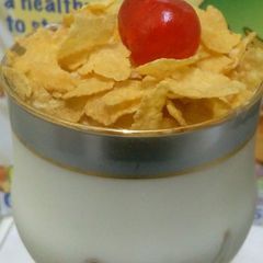 A picture of Yoghurt and cereal parfait.