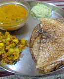 Bread and cooked rice masala dosa with sambhar and chutney