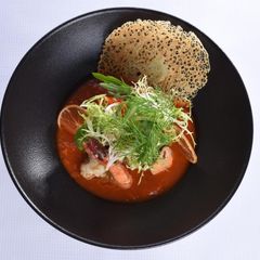 A picture of Calamari with spicy tomato fondue.