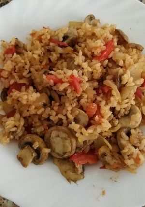 Foto principal de Arroz integral con champiñones y tomate