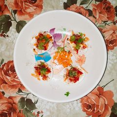 A picture of Boiled Eggs With Veggies Toppings.