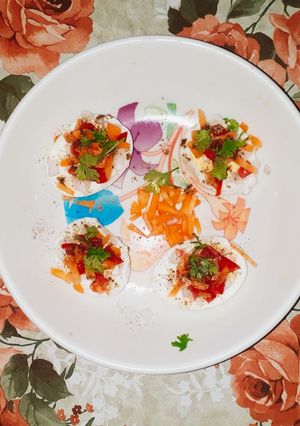 A picture of Boiled Eggs With Veggies Toppings.