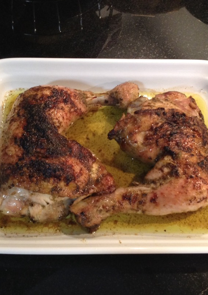 Una foto de Cuartos traseros de pollo al horno