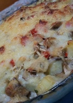 Una foto de Merluza con salsa bechamel al horno
