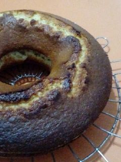Una foto de Torta de coco y naranja