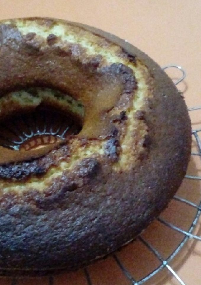 Una foto de Torta de coco y naranja