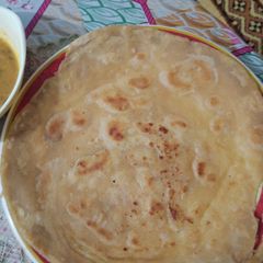 A picture of Roghni Paratha/ روغنی پراٹھے.