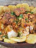 Coliflor al ajoarriero con patatas fritas