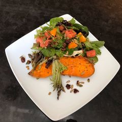 A picture of Baked Sweet Potatoes and Watermelon Green Salad.