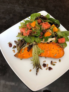 A picture of Baked Sweet Potatoes and Watermelon Green Salad.