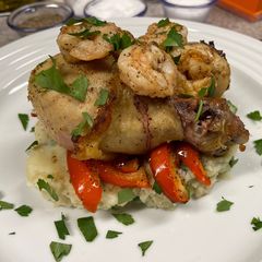 A picture of Baked Garlic-Lime Chicken Drums and Shrimp.